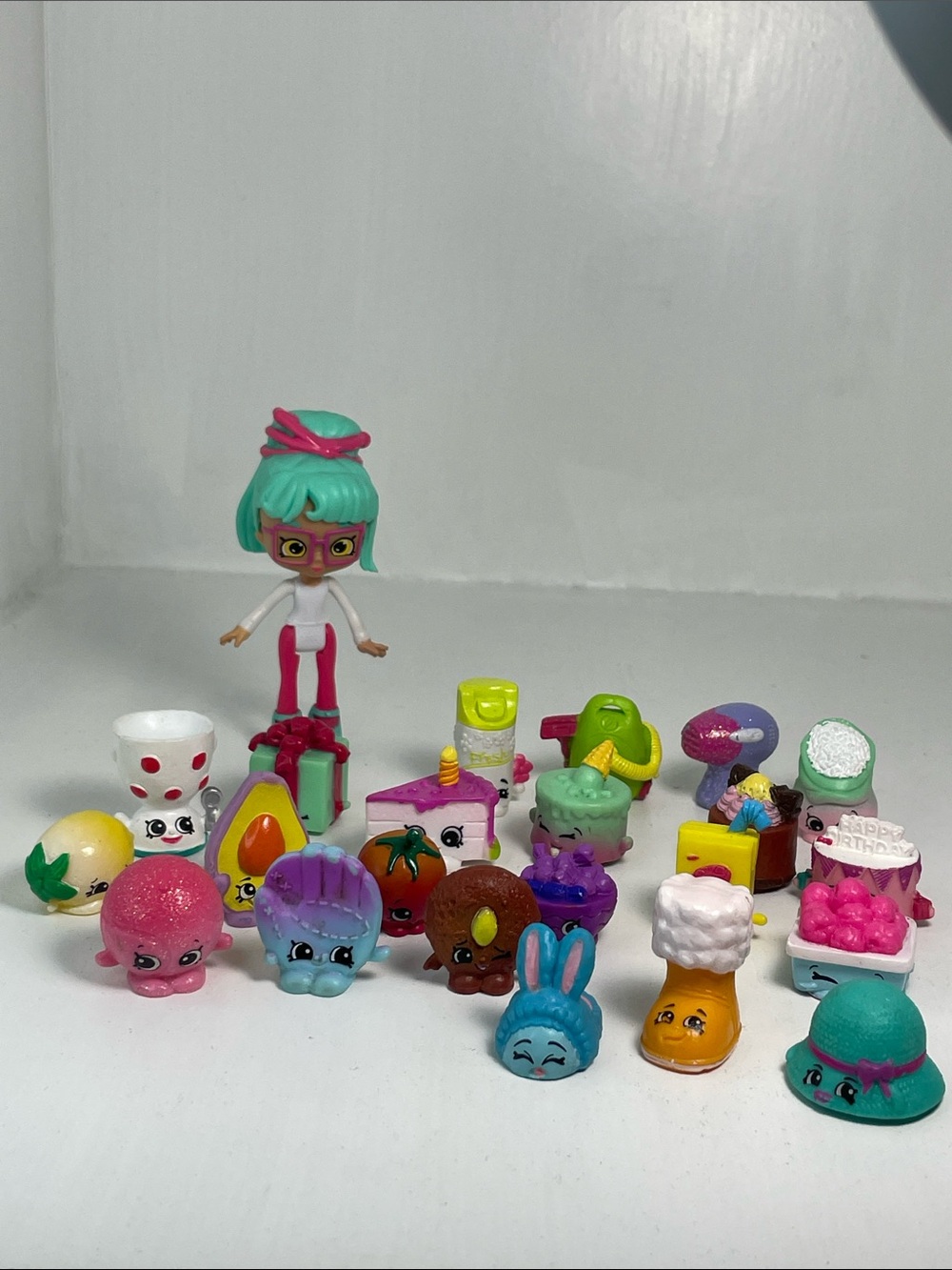 Shopkins Happy Places Doll and collection of shopkins.